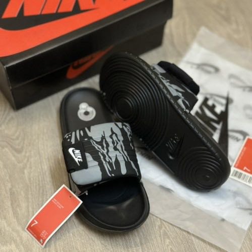 NIKE OFF COURT ADJUSTABLE