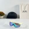 Oakley_9957_Yellow_Blue_Revo