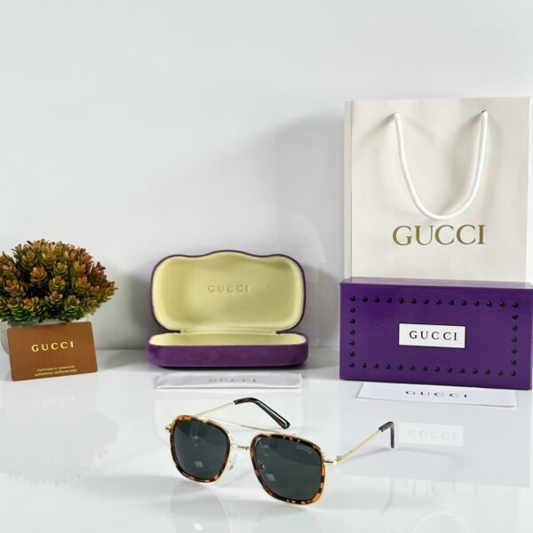 Gucci_6639_Tiger_Gold_Black